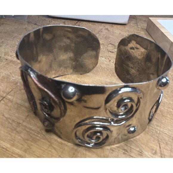 Handcrafted Silver-Toned Metal Cuff Bracelet With Swirl & Dot Pattern - Picture 1 of 14